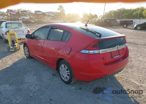 2012 Honda Insight from USA, damaged, VIN JHMZE2H33CS000620